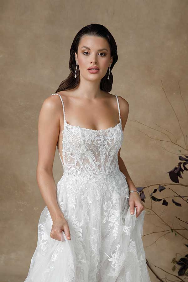 wedding dress with see-through floral lace bodice