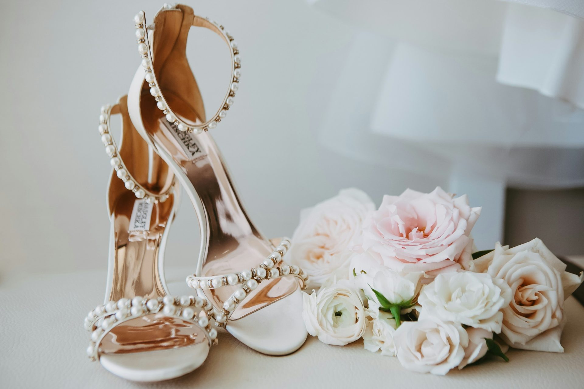 Beaded white high heels and blush colored roses (bridal accessories)
